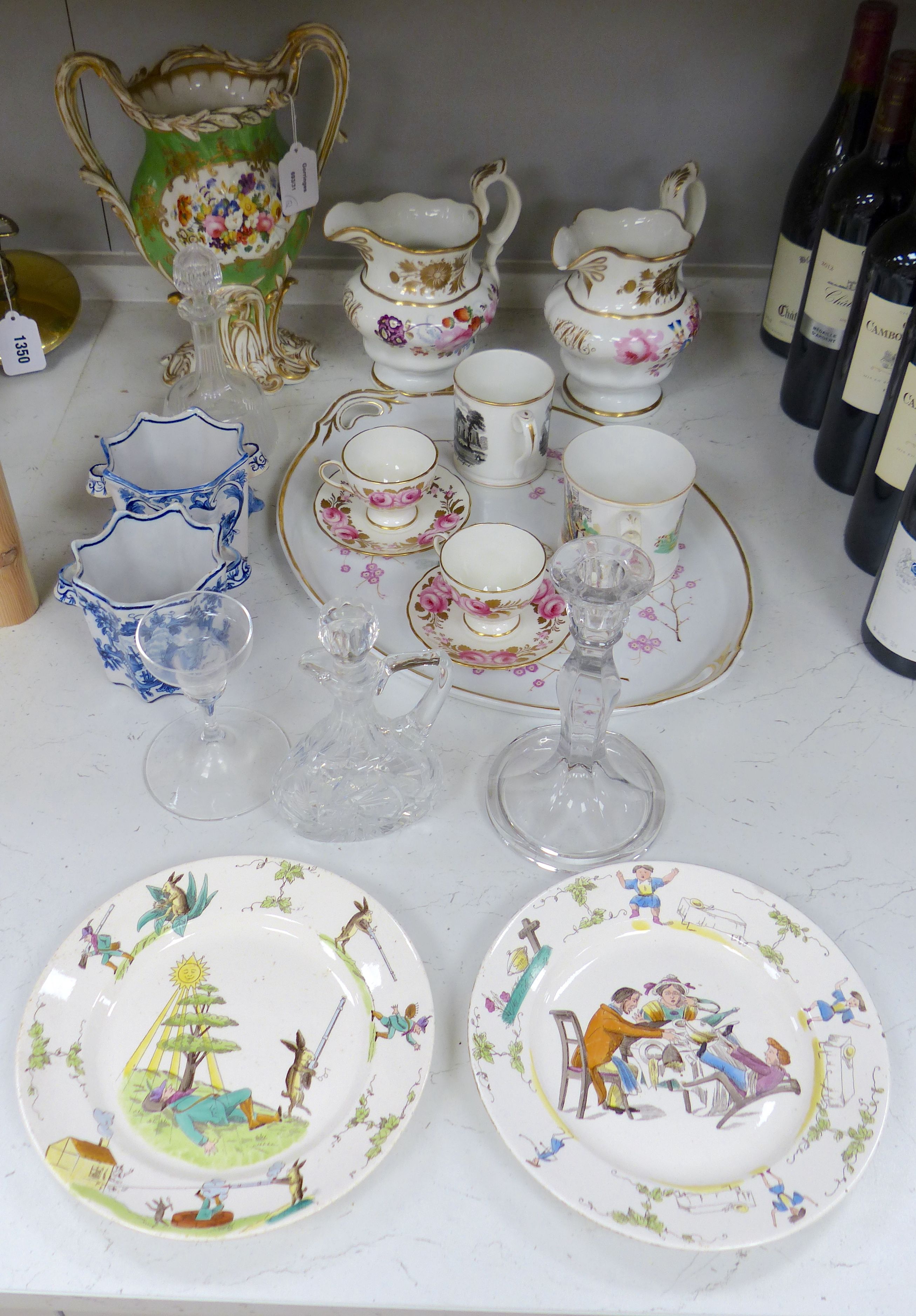A Continental porcelain two handled tray painted with flowers and gilded with initials, a large English vase, a pair of Delft of vases, two Foley cup and saucers, two English jugs and other items